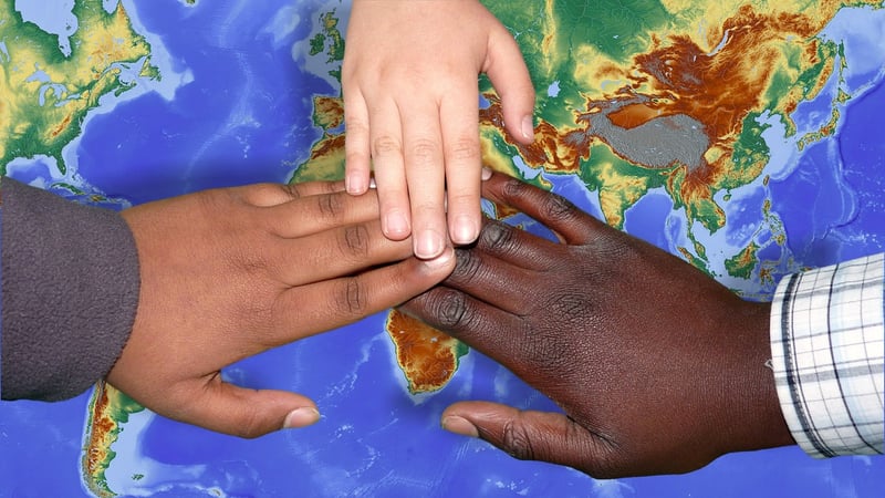 Diverse individuals holding hands